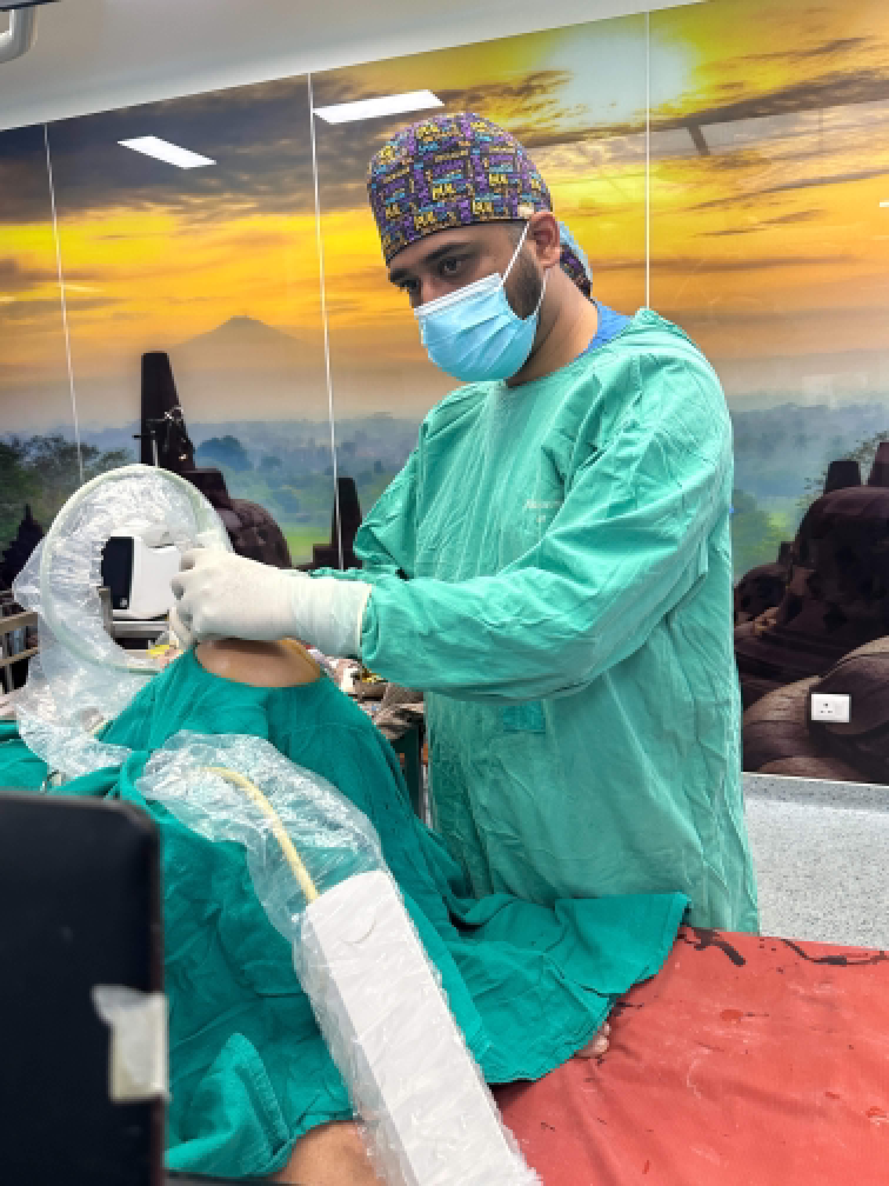 Dr. Deepak during a clinical procedure