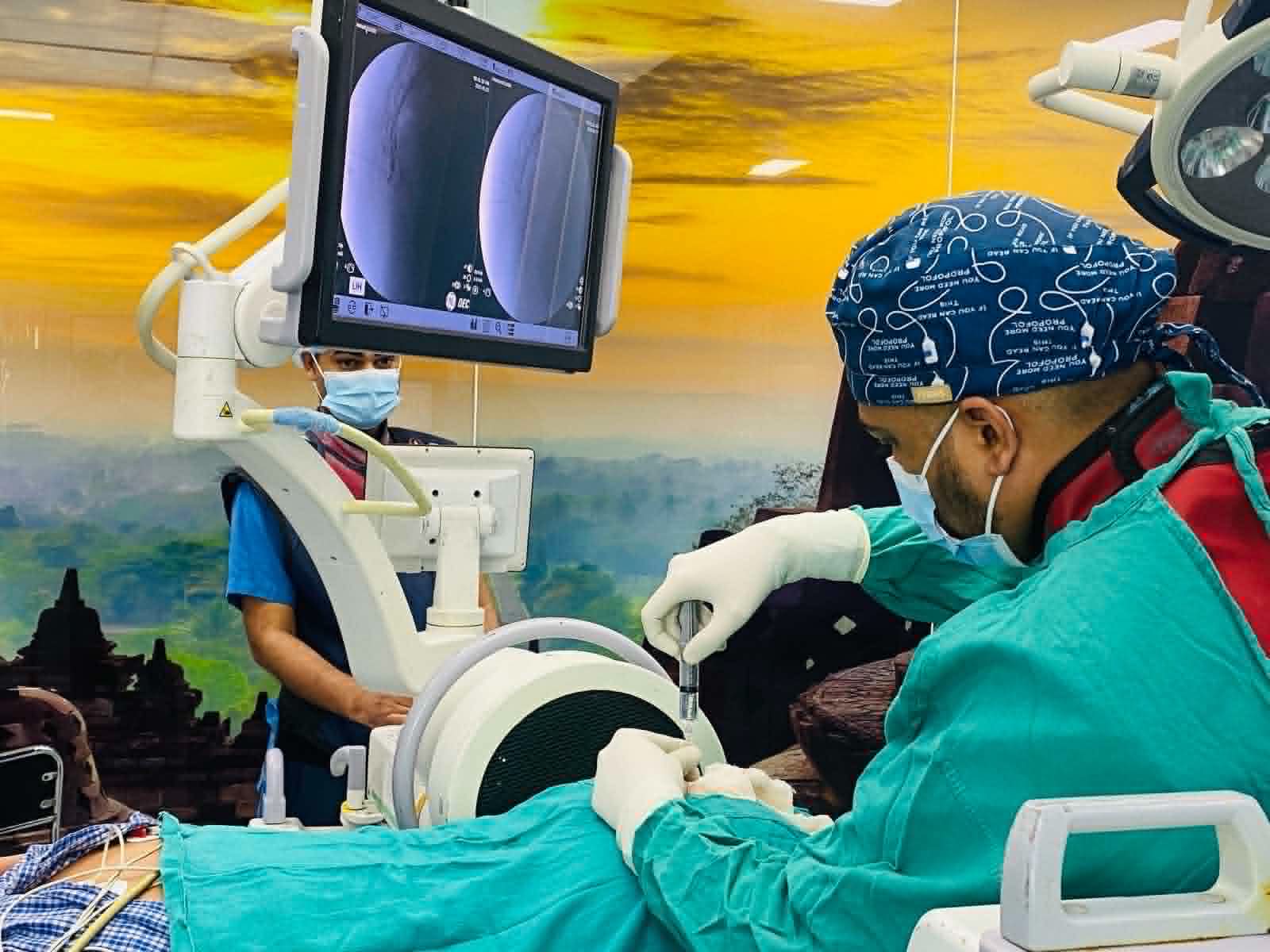 Dr. Deepak performing a pain management procedure