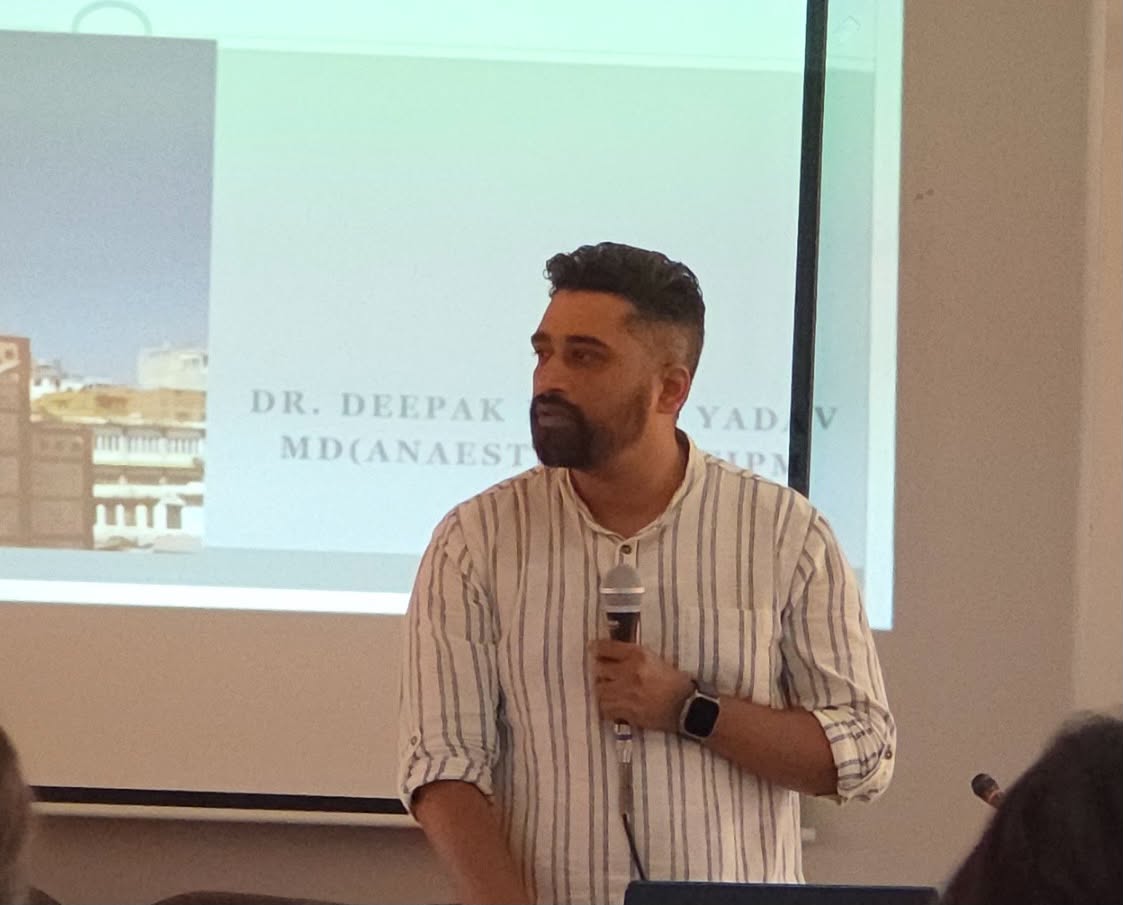 Dr. Deepak giving a presentation
